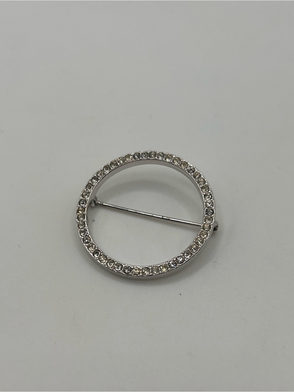 Vintage Trifari silver tone rhinestone circle brooch